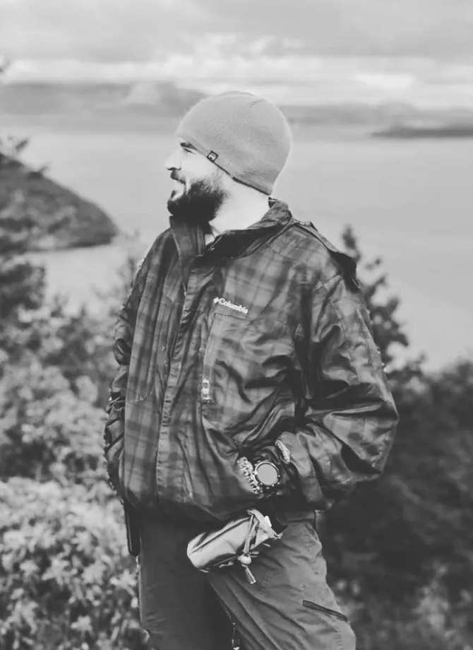 André Amnc on a hillside above the sea